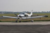 G-ROBN @ EGHH - Parked at DS Pilatus Centre - by John Coates