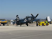 N7825C @ CMA - 1949 Grumman F8F-2 BEARCAT, P&W R-2800-34W 2,100 Hp, spotting on flight line - by Doug Robertson