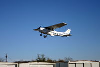 N735RR @ 52F - Doing touch and goes on Runway 35. - by flyboybma