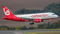 OE-LOB @ EDDR - on final after a flight from Tegel - by Friedrich Becker