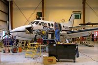 N256TA @ CYBW - Beech A90 King Air [LJ-256] Calgary-Springbank~C 22/07/2008. Undergoing overhaul. - by Ray Barber