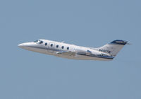 N492TM @ TPA - Hawker-Beechcraft 400A Lifting off Rwy 36L at Tampa Int'l Airport - by Ron Coates