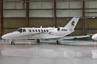N18GA @ KCVG - At the Delta Private Jets hangar - by Peachair
