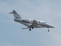N492TM @ CYYZ - 2007 Hawker-Beechcraft 390 landing on Rwy 24R at Toronto Int'l Airport - by Ron Coates