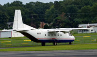 N99TF @ KOMH - Taxi for takeoff Orange - by Ronald Barker