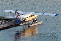 C-GHAG @ CYHC - Harbour Air #317 at the Coal Harbour terminal shortly after sunrise. - by M.L. Jacobs