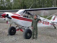 N786M @ ? - Arctic Refuge Law Enforcement Officer Heather Bartlett stands alongside the Super Cub she flies over wide expanses of Alaska as the U.S. Fish and Wildlife Service’s only female pilot/law enforcement officer. (USFWS) - by USFWS