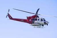N304FD @ KLAX - Taken from Dockweiler Beach.  Los Angeles City Fire Department. - by speedbrds