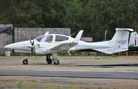 G-DMND @ EGHH - At DS Worldwide - by John Coates