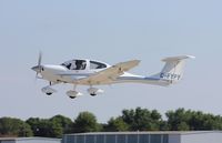 C-FYPY @ KOSH - Diamond DA-40 - by Mark Pasqualino