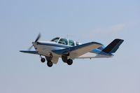 N6020E @ KOSH - Beech K35