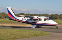 G-HUBB @ EGHH - Taxiing to depart - subtle Ravenair titles. - by John Coates