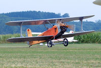 D-EOSM @ EDMT - Udet U.12a Flamingo (replica) [1785] (Flugwerft Schleissheim) Tannheim~D 24/08/2013 .Now heading towards the German Military aircraft display and general display area and crowd line. Aircraft in front of me moving down to take off still. - by Ray Barber