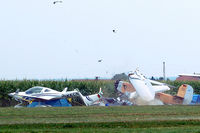 D-EOSM @ EDMT - Udet U.12a Flamingo (replica) [1785] (Flugwerft Schleissheim) Tannheim~D 24/08/2013. Run over tent and photographer lying prone on the ground. Swung further round and debris flying through the air into the cornfield. - by Ray Barber