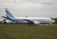 SX-VIP @ EGHH - Being towed from European apron. - by John Coates