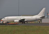 G-JMCM @ EGHH - Parked on cargo apron. - by John Coates