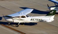 N575ND @ KGFK - University of North Dakota Cessna 172S Skyhawk taxiing from the Charlie ramp to the active runway. - by Kreg Anderson