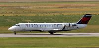 N8837B @ KGFK - Delta Connection Bombardier CRJ-200 landing on runway 17R.