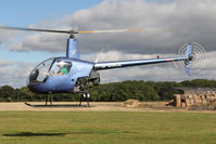 G-BSCE @ EGBR - Robinson R22 Beta at The Real Aeroplane Club's Helicopter Fly-In, Breighton Airfield, September 22 2013. - by Malcolm Clarke