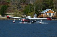 C-FDYE - Water takeoff from Lake Massawippi in North Hatley, QC Canada - by George Grefe