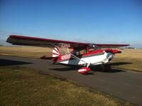 N2650Z @ KGBG - In front of my hanger on a Sunny Sunday afternoon in Feb. - by Scott Delawder