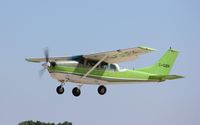 C-GUEK @ KOSH - Cessna P206D - by Mark Pasqualino