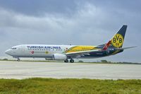 TC-JHU @ EGGW - Turkish Airlines '2013 Boeing 737-8F2, c/n: 42002 in the colours of German Soccer team BORUSSIA DORTMOND - by Terry Fletcher