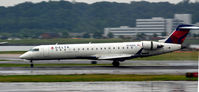 N740EV @ KDCA - Landing roll National - by Ronald Barker