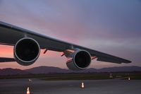RA-82043 @ LOWG - Left wing in the sunset - by Paul H