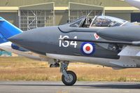 XP924 @ EGHH - Close up of resident taxiing home - by John Coates