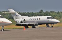 F-HCSL @ EGHH - Parked at JETS. - by John Coates