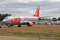 G-GDFT @ EGHH - Taxiing to depart after respray - by John Coates