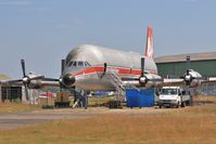 N447FT @ EGHH - All 4 engines and props installed. - by John Coates