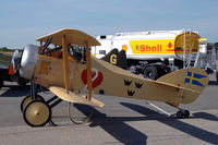 SE-XIL @ ESOE - Mikael Carlson's Tummelisa replica has been repainted to represent the 5th production aircraft from 1925, with the Ace of Hearts insignia on the fuselage. Here it is parked at Örebro airport, Sweden. - by Henk van Capelle