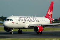 EI-EZW @ EGCC - Taken from the Aviation Viewing Park. - by Carl Byrne (Mervbhx)