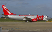 G-CELW @ EGSH - Being pulled up to the KLM Uk hangar after arriving from Bournemouth where it was sprayed into standard Jet2 C/S....