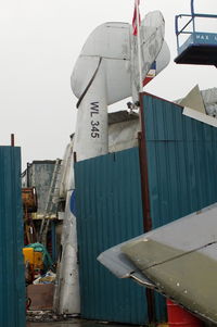 WL345 @ EGTB - just the tailboom visible inside the Parkhouse Aviation yard at Booker - by Chris Hall