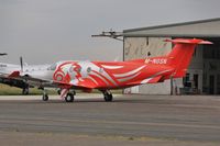 M-NGSN @ EGHH - Parked at Pilatus East - by John Coates
