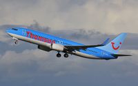 G-TAWJ @ EGHH - Early climb into strong headwind after storm. - by John Coates