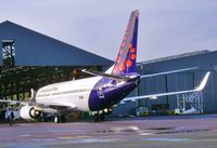OO-VEH @ EGHH - Exiting paintshop after respray to Brussels Airlines livery - by John Coates