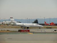 N827QS @ KOAK - Cessna with HH-64 in the background - by Paul H