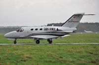 HB-VWS @ EGHH - Taxiing to Signatures on a grey wet day - by John Coates