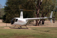 VH-HEV @ N.A. - Robinson R44 II helicopter on its landing spot at Victoria River Roadhouse, N.T. It was used for sight-seeing flights.
