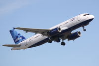 N729JB @ KSRQ - JetBlue Flight 164 (N729JB) If You Can Read This, You're Blue Close departs Sarasota-Bradenton International Airport - by Donten Photography