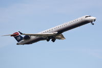 N904FJ @ KSRQ - US Air 2884 operated by Mesa (N904FJ) departs Sarasota-Bradenton International Airport - by Donten Photography