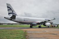 P4-TAS @ EGHH - Just repainted..and being taken for a walk....to... - by John Coates