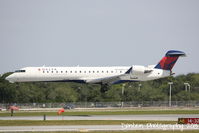 N740EV @ KSRQ - Delta Flight 4935 operated by ExpressJet (N740EV) arrives at Sarasota-Bradenton International Airport following a flight from Laguardia Airport - by Donten Photography