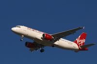 N634VA @ KJFK - Going to a landing on 31R @ JFK - by Gintaras B.
