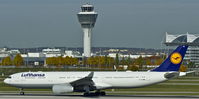 D-AIKN @ EDDM - Lufthansa, is speeding up at München(EDDM), with the tower in the background - by A. Gendorf