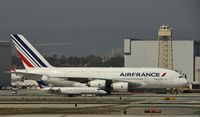 F-HPJH @ KLAX - Taxing to gate with a little escort - by Todd Royer